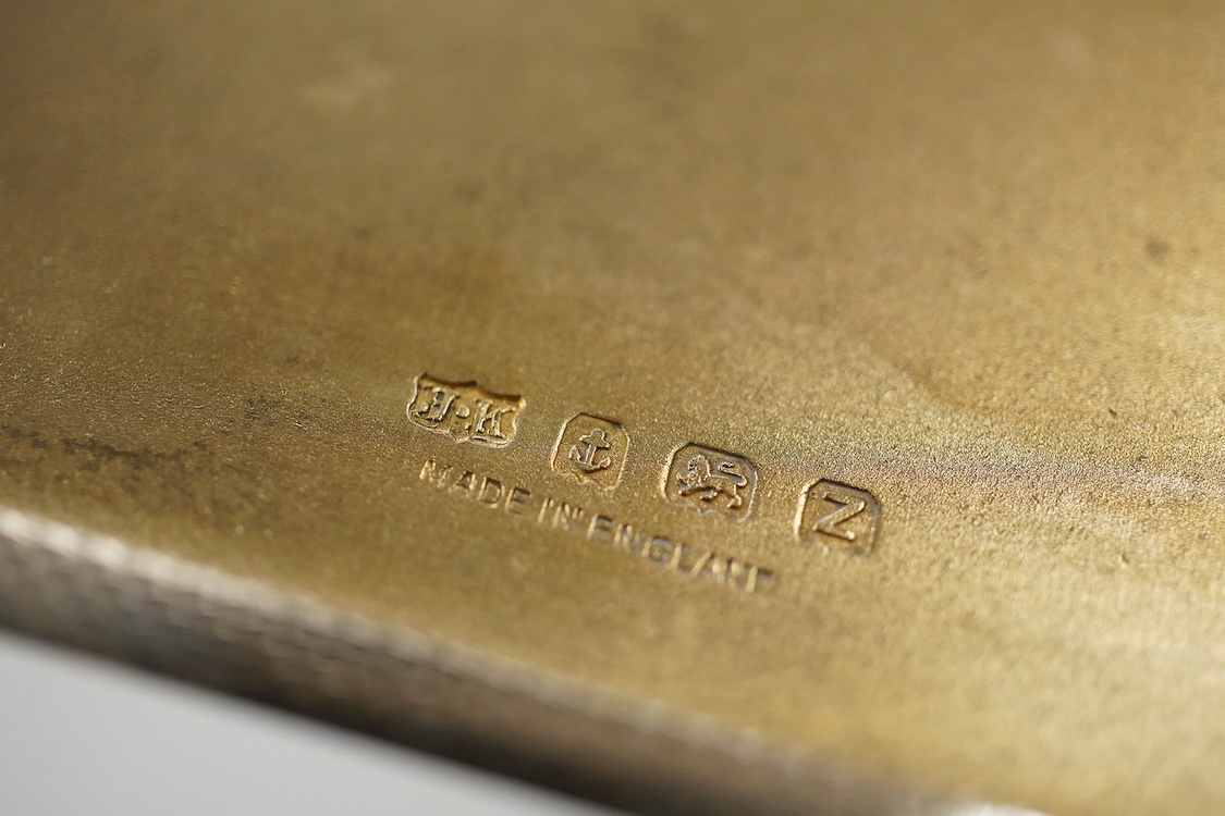 A George V silver pedestal bon bon dish, Sheffield, 1921, diameter 13.2cm, one other earlier silver dish by Josiah Williams & Co, London, 1904 and a silver cigarette case. and a cigarette case, gross 11.5oz.